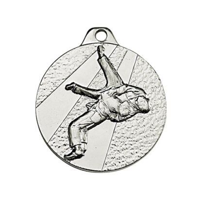 Médaille en fer de couleur argent de 32mm de diamètre représentant deux judokas en combat