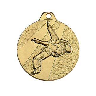 Médaille en fer de couleur or de 32mm de diamètre représentant deux judokas en combat