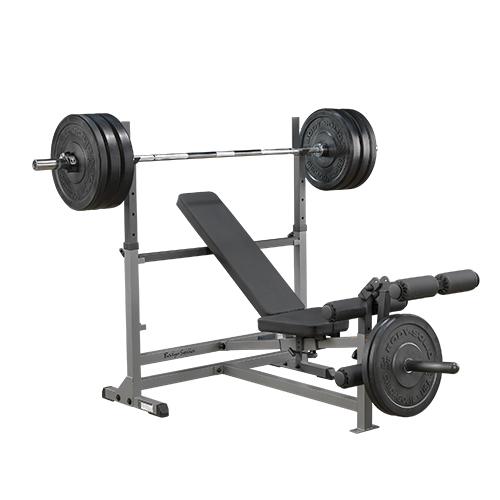 Machine musculation fond blanc disques banc
