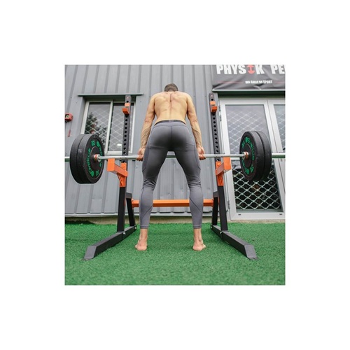 Sportif vu de dos utilisant une Half Rack Sveltus